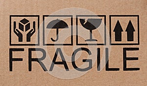 Fragile icons on cardboard