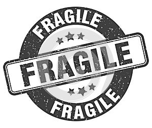 fragile stamp. fragile label. round grunge sign