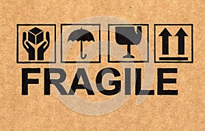 Fragile symbol on cardboard photo