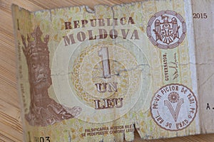 The Fragility of Currency: A Torn Un Leu Banknote from Moldova