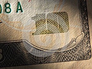 The fragment of 10 dollar bill.