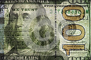 fragment of 100 dollar banknote with visible details of banknote reverse