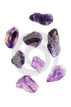 Fragment of amethyst minerals on background