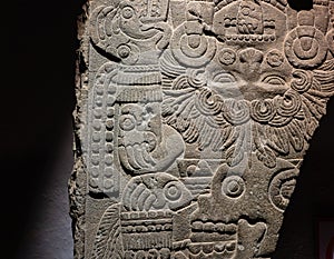 Fragment of ancient aztec sculpture in Great Temple Templo Mayor. Culture of native americans. Travel photo. Mexico