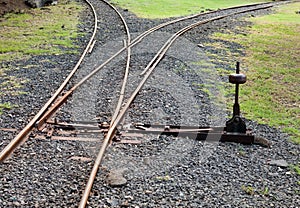 Fragment of the ancient Narrow Gage Railway with an arrow
