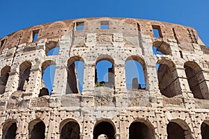 Fragment of arches of Colosseum or Coliseum Flavian Amphitheatre or Amphitheatrum Flavium or Anfiteatro Flavio or Colosseo. photo