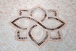 Fragment of artistic handmade tiles design background, closeup top view