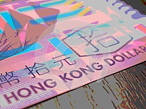 Fragment of a banknote of 10 ten Hong Kong dollars. Picture with pasteurization. Illustration about economy or finance. Hong Kong