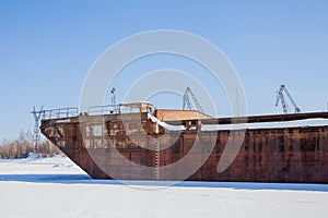 Fragment of the barge at the winter parking
