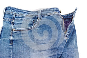 Fragment of the blue jeans on a white background