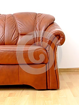 Fragment of brown sofa photo