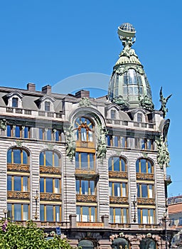 Fragment of the building of House of Books against the background of the sky. St. Petersburg. The Russian text - the Zinger Compan