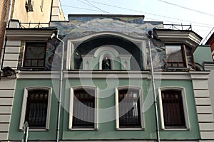 A fragment of a building in Maly Kozikhinsky Lane near the Patriarchal Ponds of Moscow