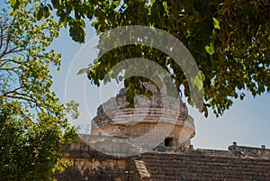 Fragment of a building. The Observatory at Chichen Itza. Mexico photo