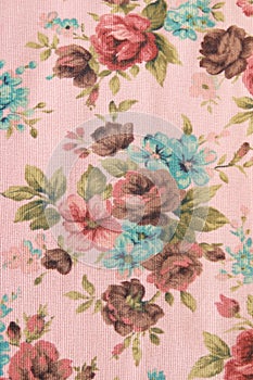 Fragment of colorful retro tapestry textile pattern with floral