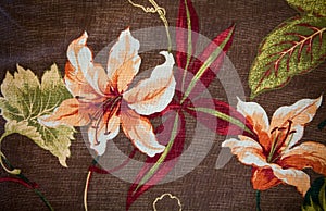 Fragment of colorful retro tapestry textile pattern with floral ornament