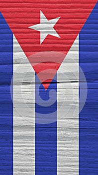 Fragment of Cuban flag on a dry wooden surface. Mobile phone wallpaper. Vertical background made of old wood. Symbol of Cuba.