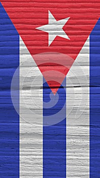 Fragment of Cuban flag on a dry wooden surface. Mobile phone wallpaper. Vertical background made of old wood. Symbol of Cuba.