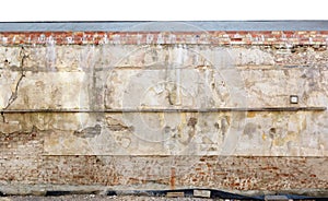 Fragment of the destroyed centenary monastery wellow wall and f