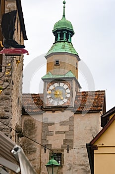 The fragment or detail of historical building at Rothenburg ob der Tauber where is the fortified city at Germany.