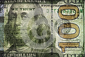 fragment of 100 dollar banknote with visible details of banknote reverse photo