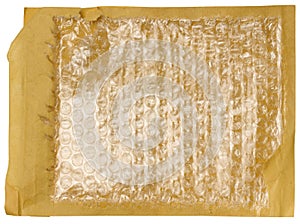 A fragment of an envelope made of brown paper with bubble wrap inside
