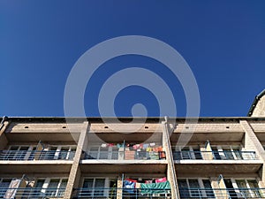 Fragment of the facade of the building, blue sky