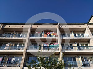 Fragment of the facade of the building, blue sky