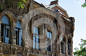 Fragment of facade burnt house, monument of architecture on the corner of Cathedral Lane and Donskaya Street in Rostov-on-Don