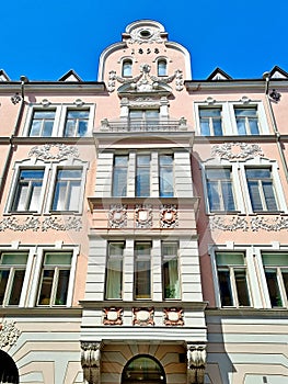 Fragment of the facade of a house with a rectangular bay window in Helsinki, Finland