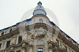 Fragment of the facade of a residential building in the style of national romanticism