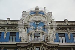 Fragment of the facade of a residential building in the style of national romanticism or art nouveau