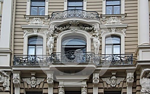 Fragment of the facade of a residential building in the style of national romanticism or art nouveau