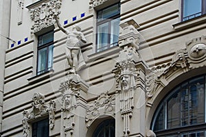 Fragment of the facade of a residential building in the style of national romanticism or art nouveau