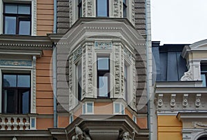 Fragment of the facade of a residential building in the style of national romanticism on Elizabeth Street