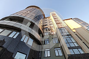 Fragment of facade wall of modern glass skyscraper