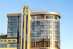 Fragment of facade wall of modern glass skyscraper