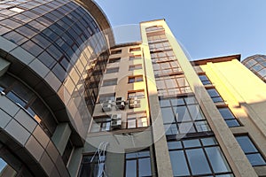 Fragment of facade wall of modern glass skyscraper