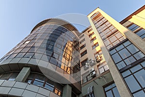 Fragment of facade wall of modern glass skyscraper