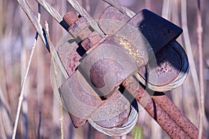 fragment of fastening a tensioned steel cable