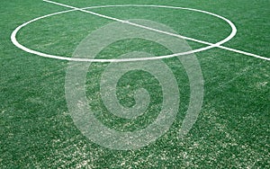 Fragment of footbal field with artificial grass