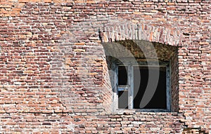 A fragment of a fortress wall with a windowm