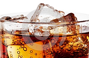 Fragment of glass cola with ice