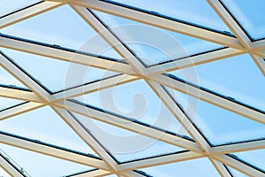 A fragment of a glass dome on the roof of the building. Geometric glass dome. Modern ceiling architecture