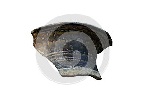 Fragment of glazed jar with single mouth-rim, dark and dull natural fly-ash glaze on exterior, isolated on white.