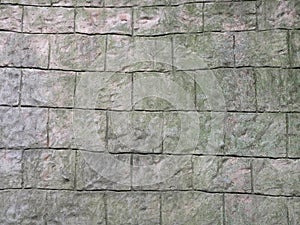 Fragment of a gray wall with rough stone masonry. Not seamless texture