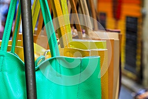 Fragment of handbags for sale at a market stall