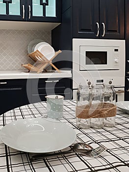 Fragment of kitchen interior with dining table