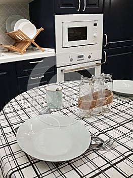 Fragment of kitchen interior with dining table