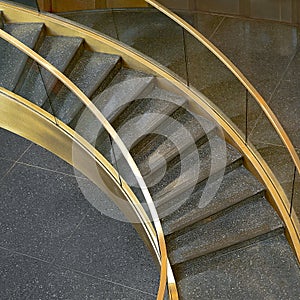 fragment of large wide staircase furnished with railing